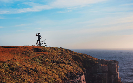 A Man with a Bicycle on a Cliff from Chrome web store to be run with OffiDocs Chromium online A Man with a Bicycle on a Cliff from Chrome web store to be run with OffiDocs Chromium online