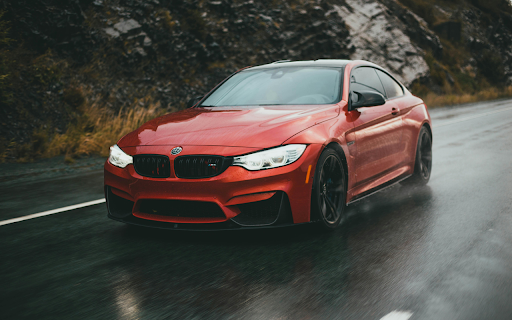 Driving a Red BMW Sportscar on the Wet Road from Chrome web store to be run with OffiDocs Chromium online Driving a Red BMW Sportscar on the Wet Road from Chrome web store to be run with OffiDocs Chromium online