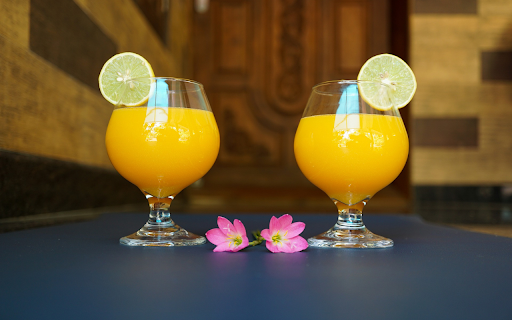 Glasses of fragrant yellow mango juice from Chrome web store to be run with OffiDocs Chromium online Glasses of fragrant yellow mango juice from Chrome web store to be run with OffiDocs Chromium online