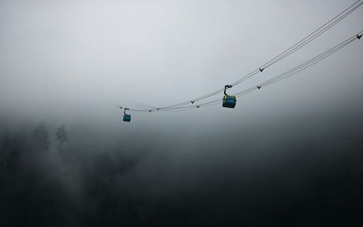 Two cable cars are suspended in the fog from Chrome web store to be run with OffiDocs Chromium online Two cable cars are suspended in the fog from Chrome web store to be run with OffiDocs Chromium online