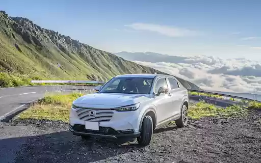 The car stopped next to the mountain from Chrome web store to be run with OffiDocs Chromium online The car stopped next to the mountain from Chrome web store to be run with OffiDocs Chromium online